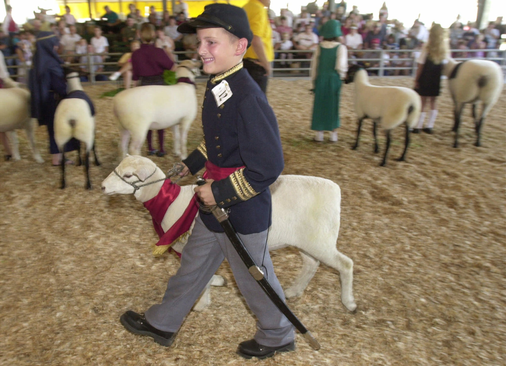 2000: Boys and girls show off their sheep